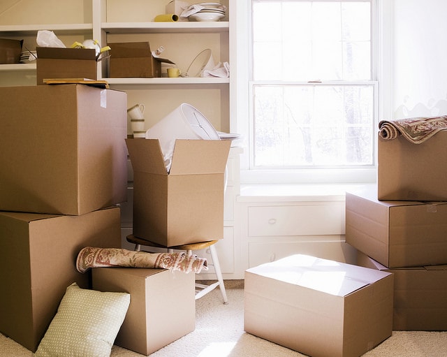 Preparing for moving homes by deep dry cleaning